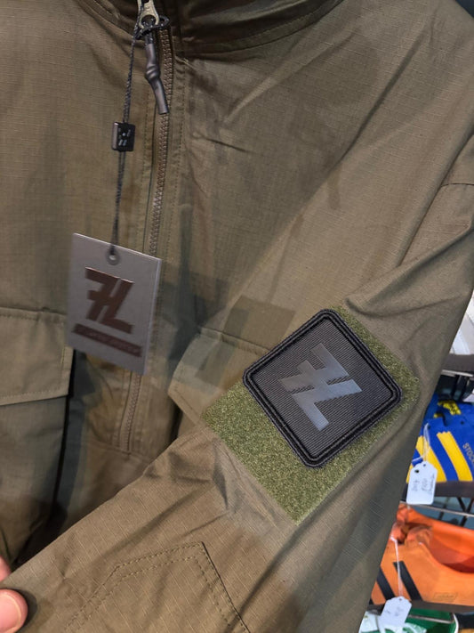 7L x Ark Air Impedance Smock - badge detail