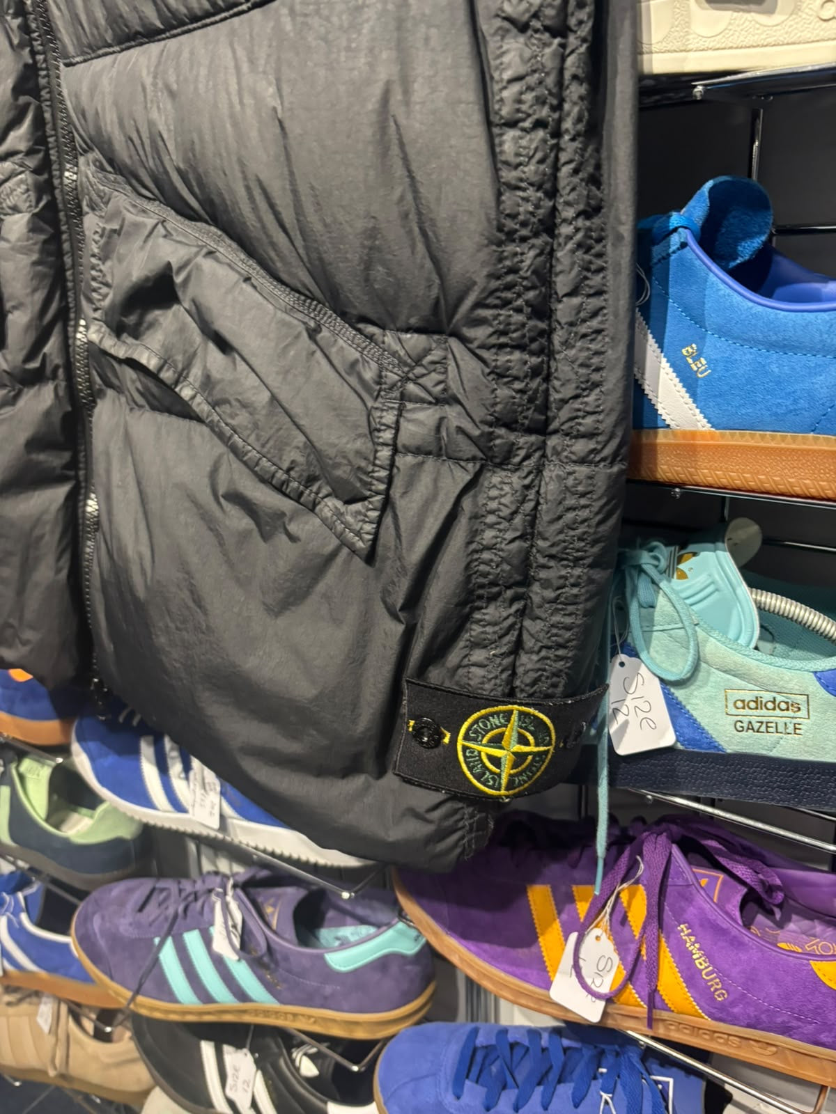 Stone Island gilet lower pocket and compass badge