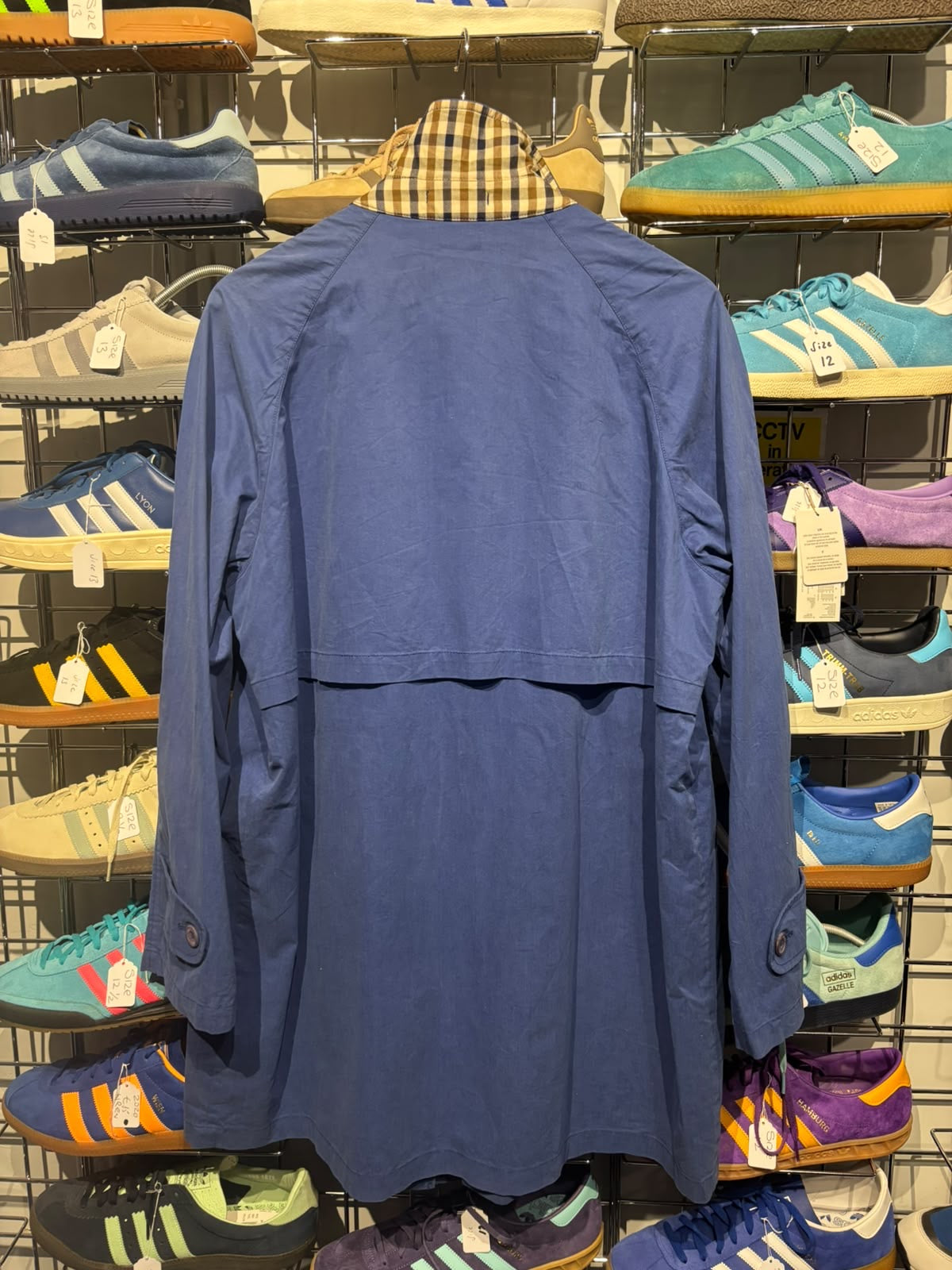 Aquascutum royal blue mac coat back with storm flap