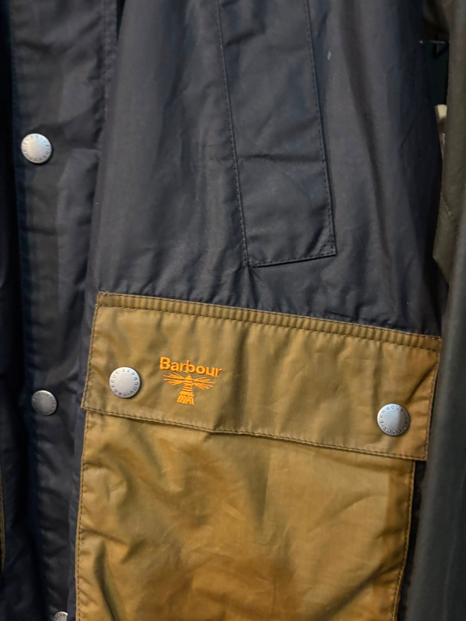 Barbour Beacon Wax Jacket Navy Olive - pocket and logo detail