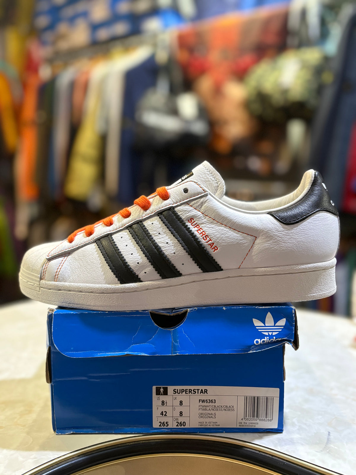 Adidas Superstar FW6363 UK 8, white panel with black Three Stripes and orange laces on original box