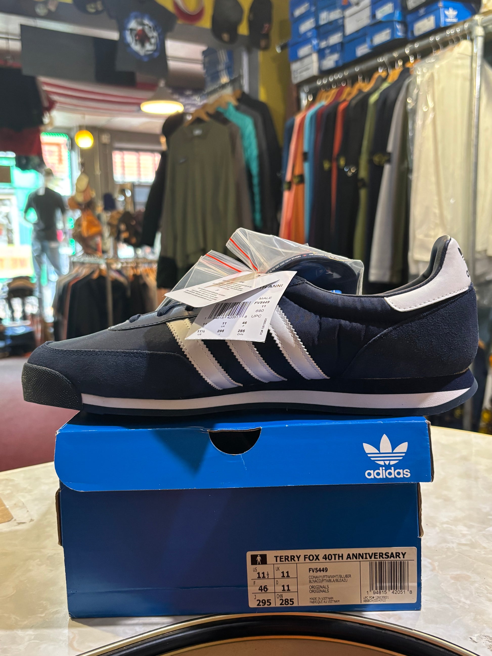 Adidas Terry Fox 40th Anniversary FV5449 Navy White - Three quarter view on box with tags