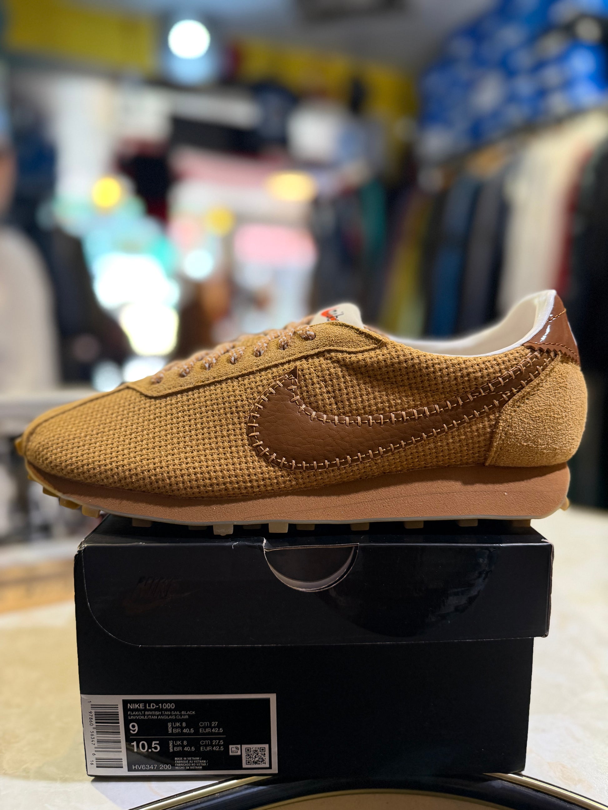Nike LD-1000 Flax Bronzine Sail Black HV6347-200 UK 8 — three-quarter view showing hand-stitched Swoosh