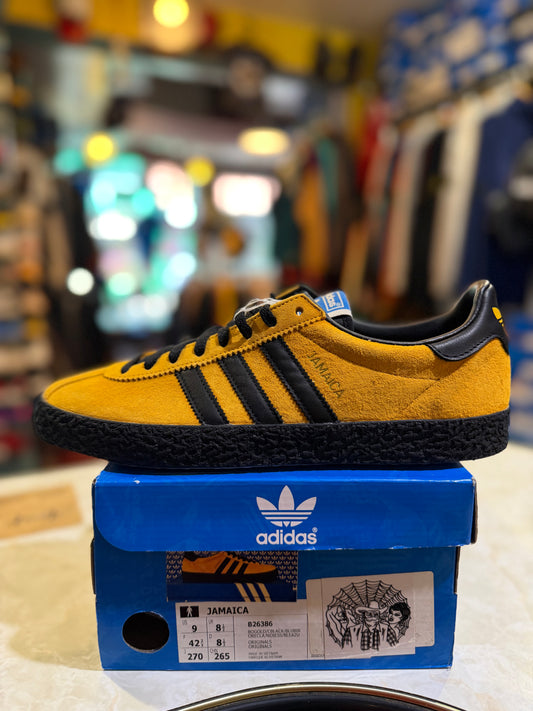 Adidas Jamaica B26386 gold and black side view on blue Adidas box