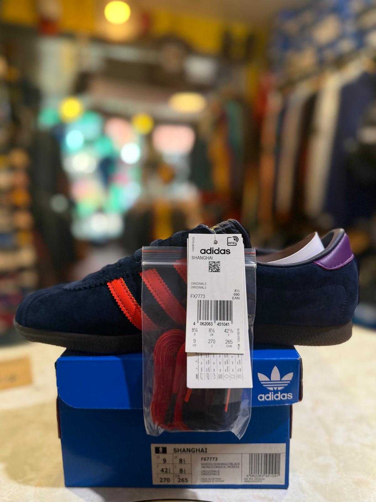 Adidas Shanghai FX7773 UK 9 navy trainer with orange stripes on original box