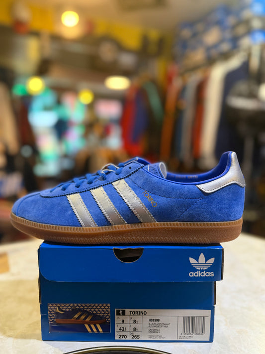 Adidas Torino H01808 UK 8.5, blue suede with silver-coloured Three Stripes and gum sole, side view on original box