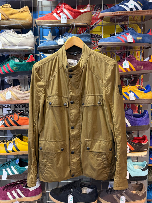 Front of olive-khaki four-pocket field jacket