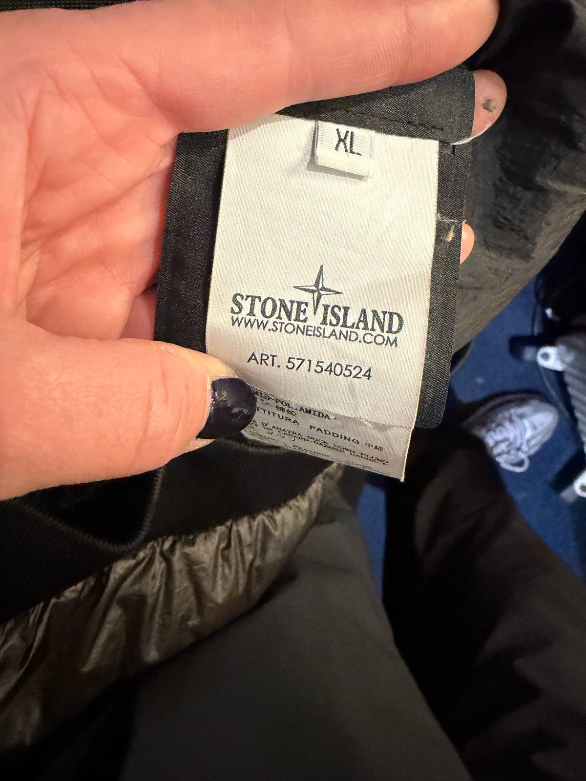Stone Island jacket label showing ART. 571540524 and size XL