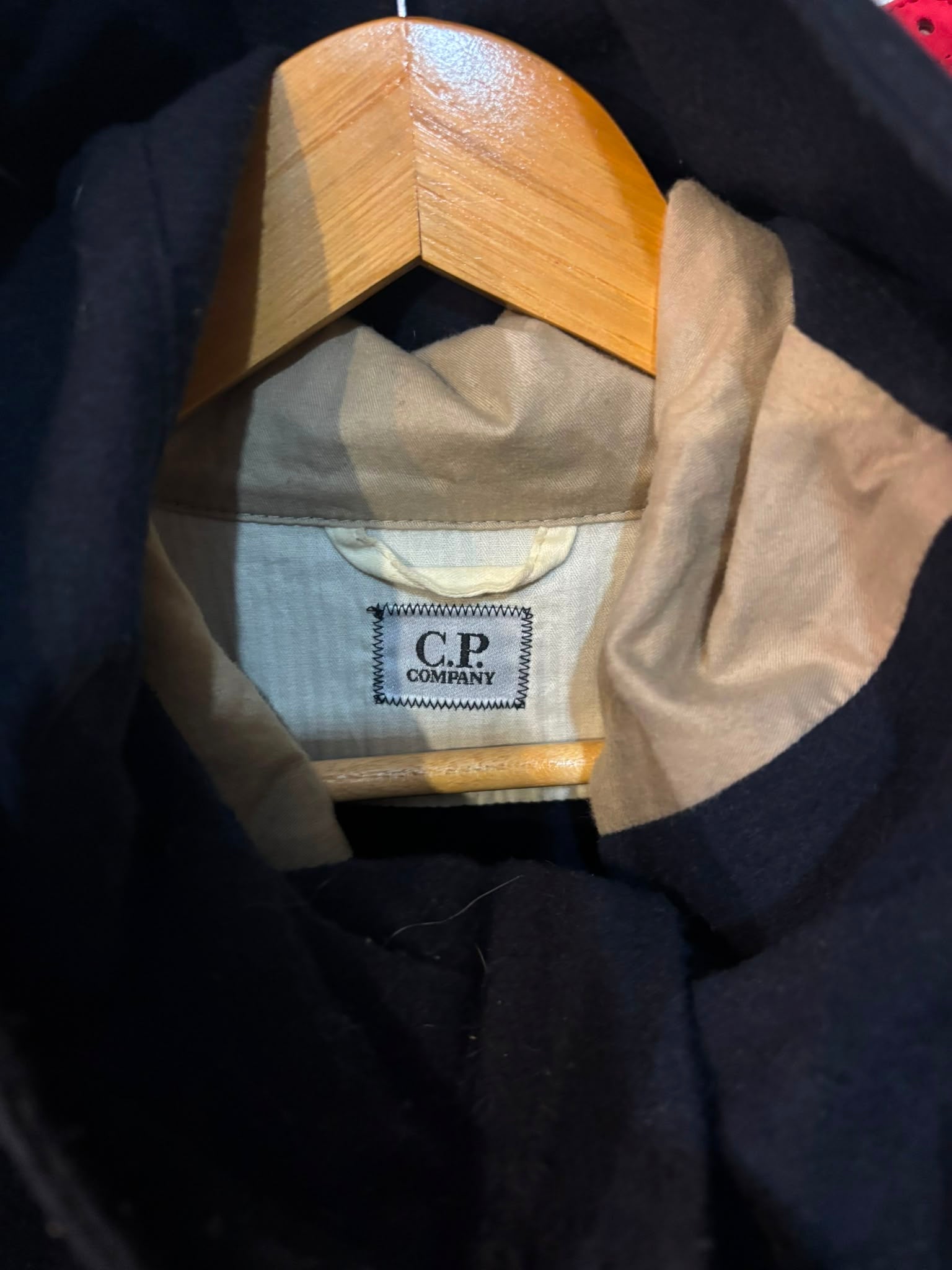 C.P. Company Archive Wool Hooded Field Jacket Navy - interior showing vintage woven C.P. Company label and tan contrast lining
