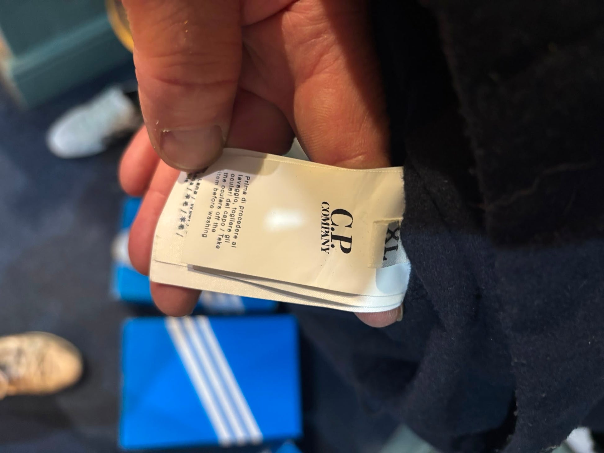 C.P. Company Archive Wool Hooded Field Jacket Navy - care label showing C.P. Company branding and XL size